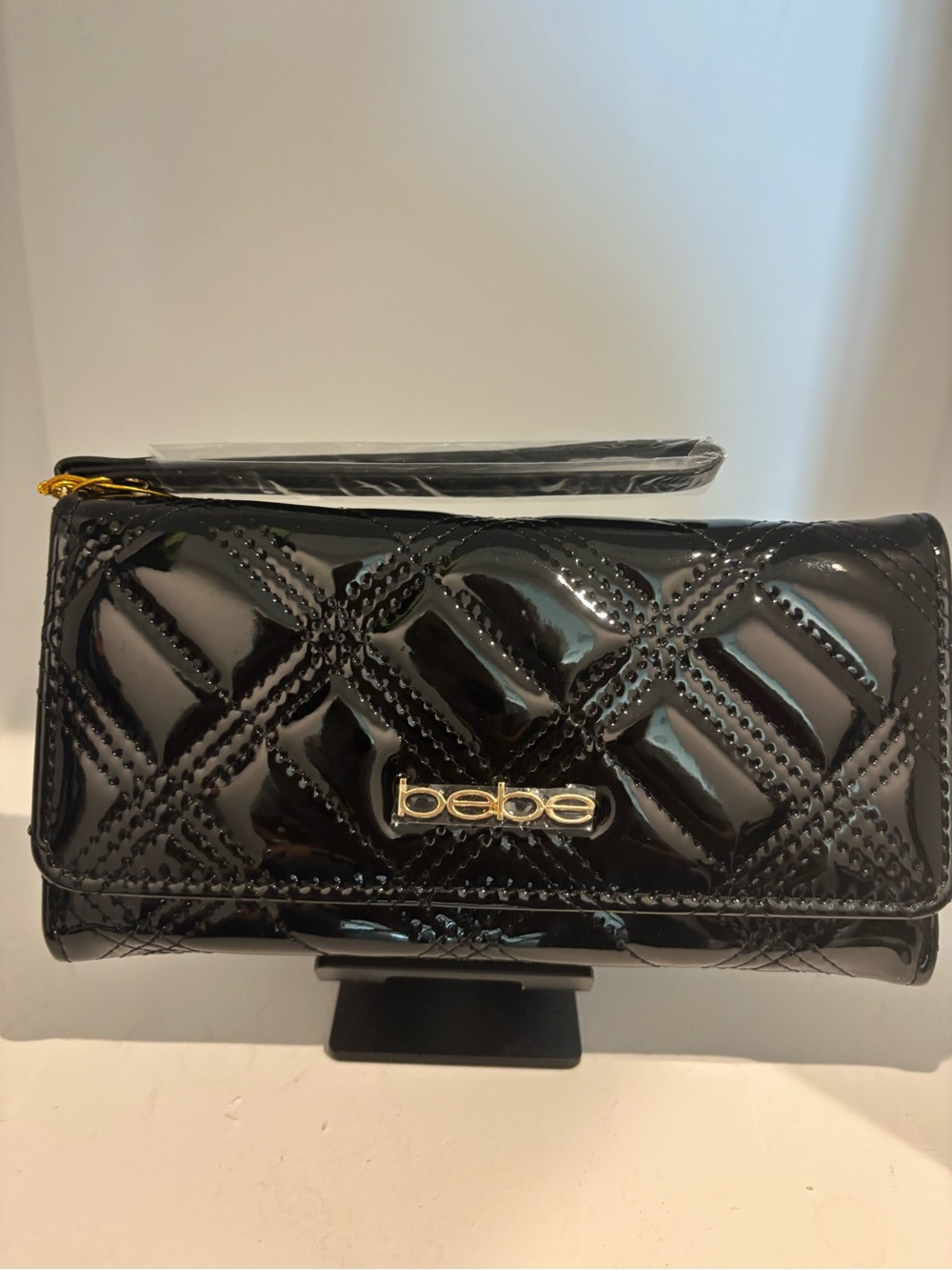 bebe Black Quilted Patent Wristlet Clutch with Gold Logo